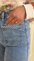 Jeans ingevlochten